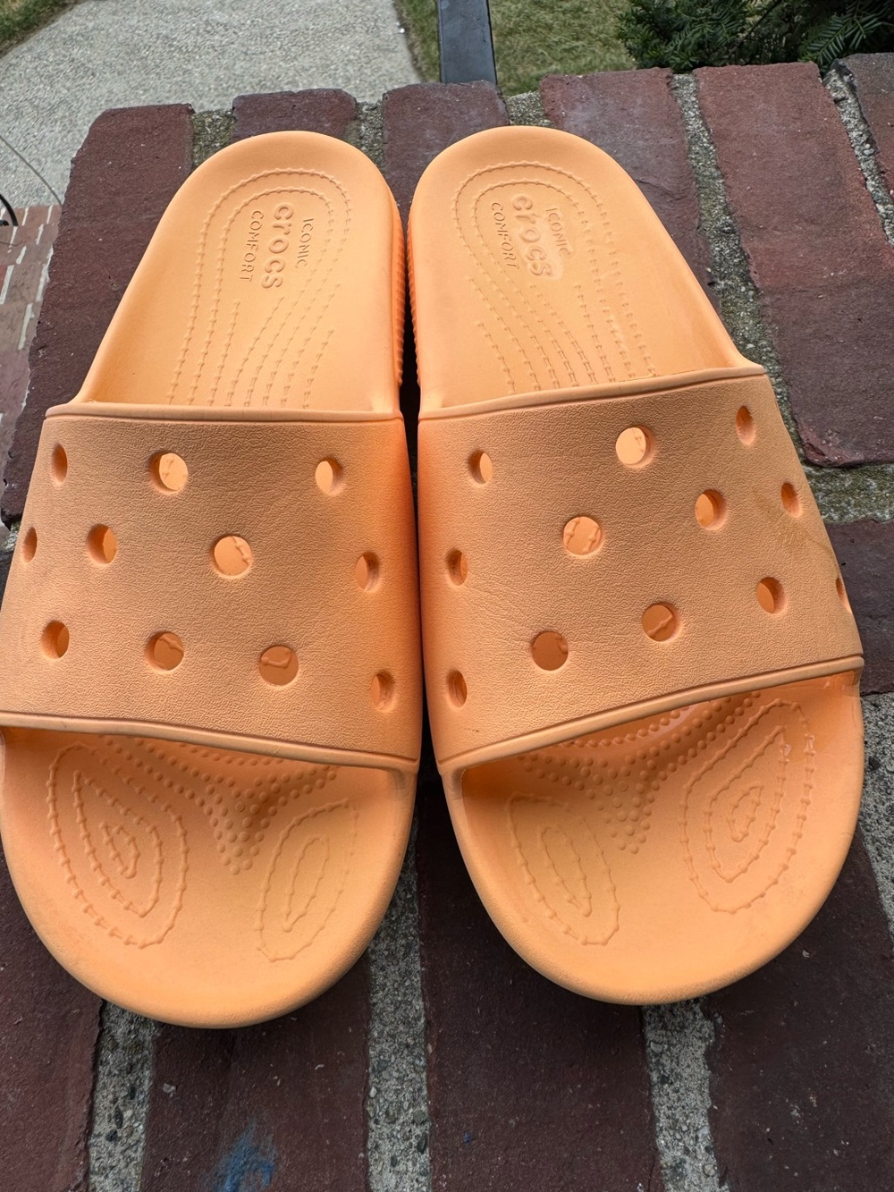 Crocs Orange Slide Sandals women’s size 10/ men’s size 8